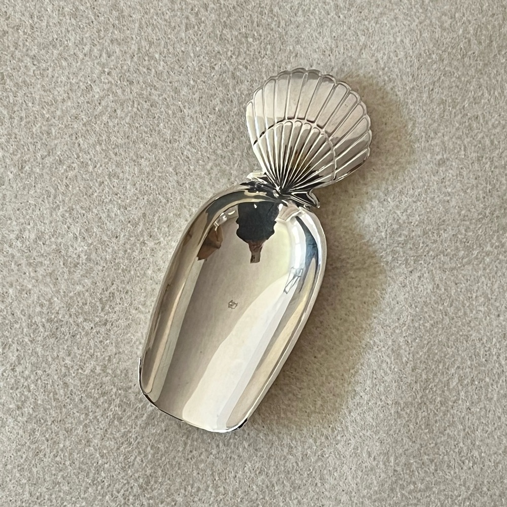 Modernist art deco style silver scooper spoon sea shell handle
